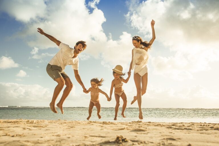 Best all-inclusive resorts for families. family on a beach